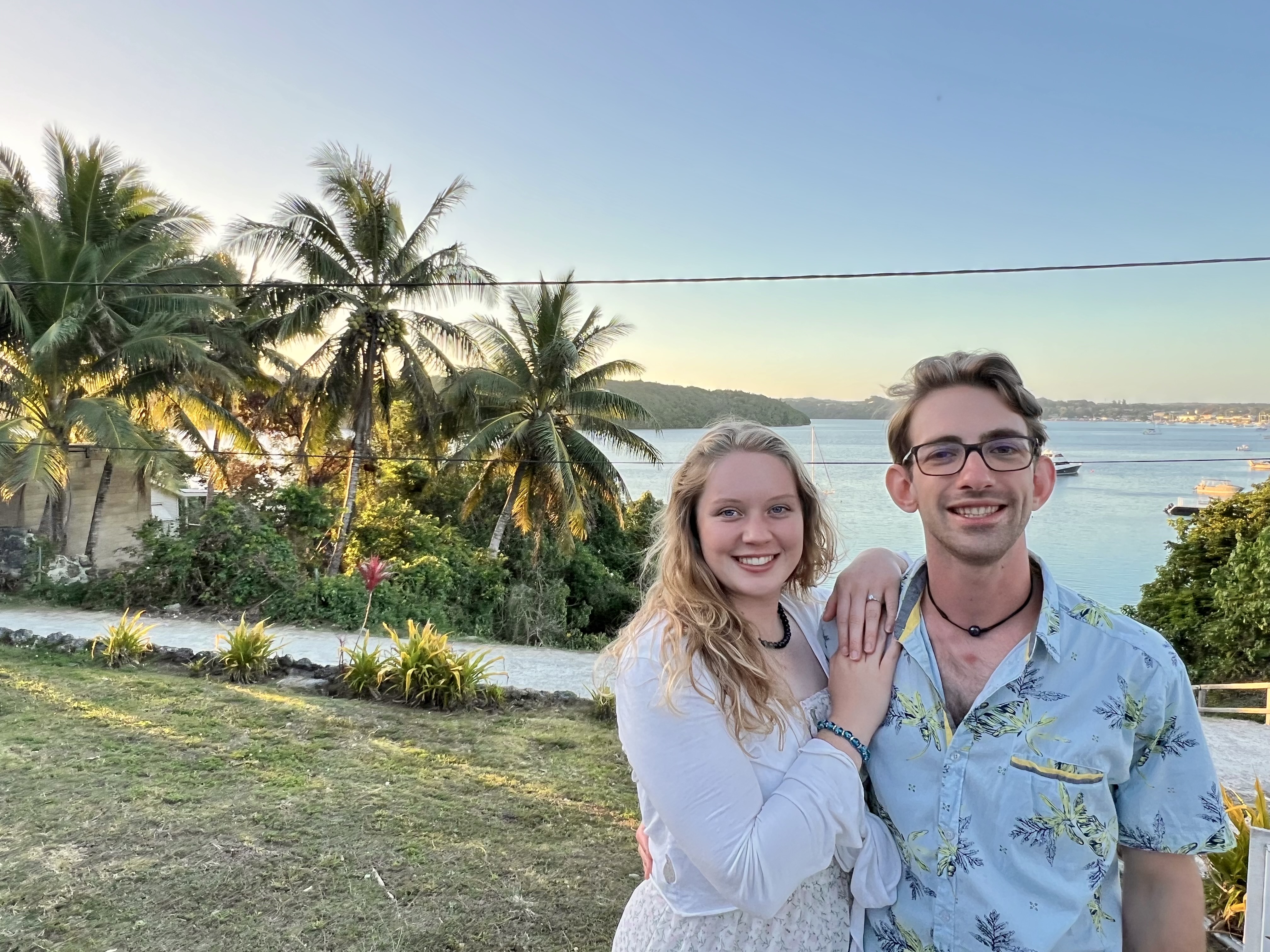 Jerome and Reese together overlooking a tropical bay