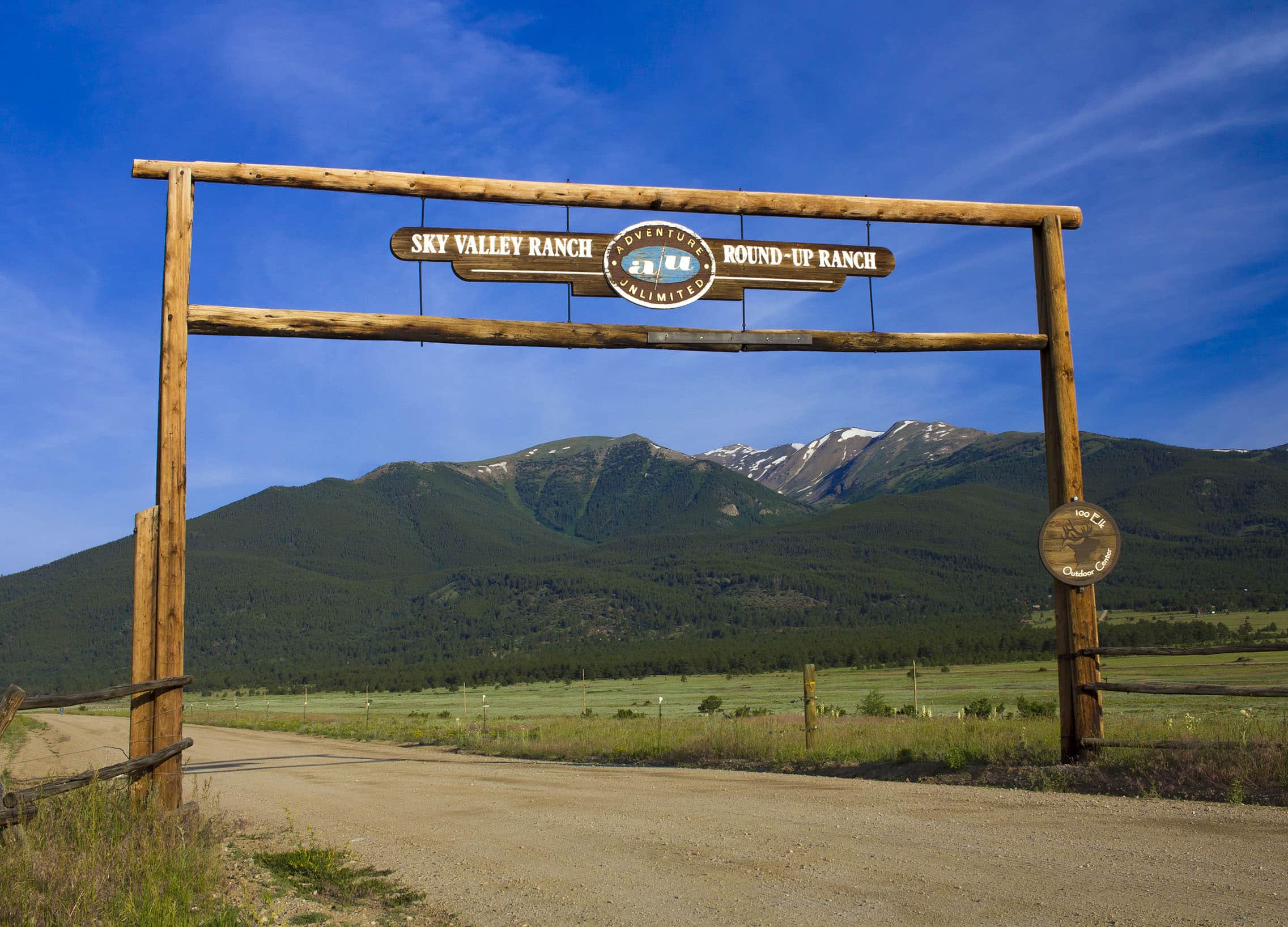 The Adventure Unlimited Ranches entrance with the Collegiate Peaks beyond